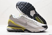 Nike Air Max 95 Sneakers in White and Volt